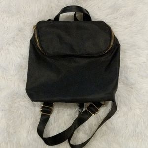 A New Day small backpack/crossbody purse